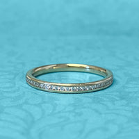 Yellow Gold Channel-Set Diamond Band