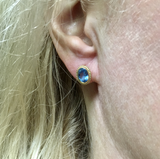Yellow Gold and Blue Topaz Oval Stud Earrings