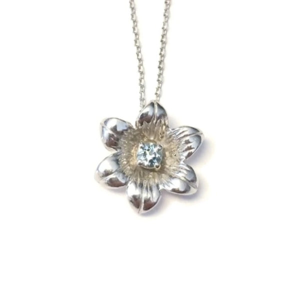 Sterling Silver Blue Topaz Floral Pendant - Exclusively Continental