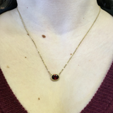 Yellow Gold and Red Garnet Horizontal Oval Pendant